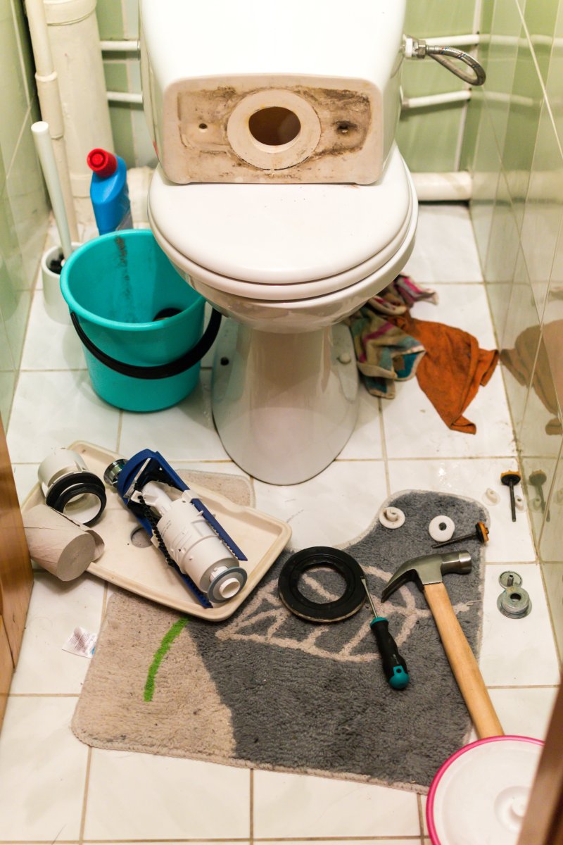 New toilet being installed in a Teddington bathroom